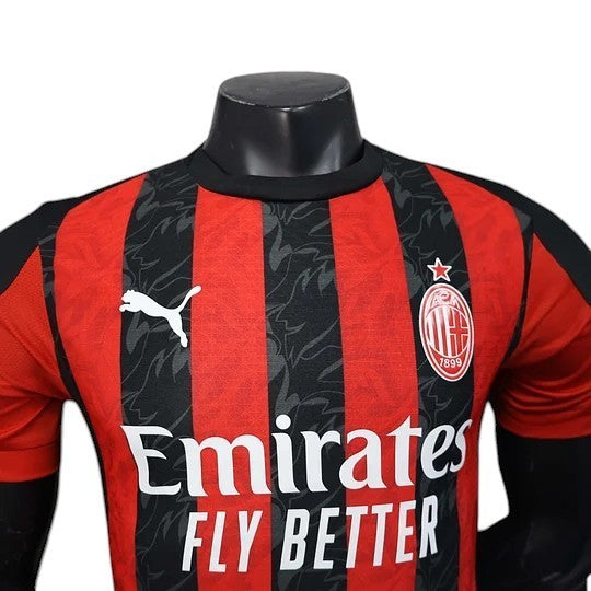 GOATkitz AC Milan 2025-26 player version home jersey, red and black stripes, Puma logo, Emirates Fly Better sponsor.