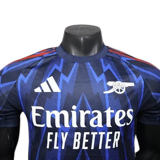 GOATkitz Arsenal 2025-26 Player Version Away Jersey, navy blue with blue geometric pattern, white Adidas logo and crest.