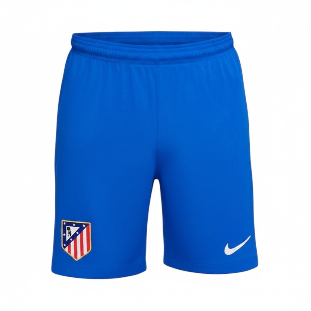 GOATkitz blue kids' soccer shorts with Atlético Madrid crest and Nike swoosh logo. Customizable.