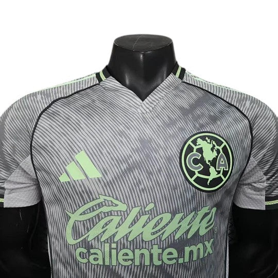 GOATkitz Club América 2025-26 player version third jersey in grey with lime green accents and graphic print. Customizable.