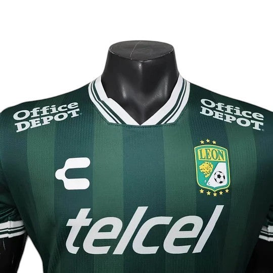 GOATkitz Club León 2025-26 player version home jersey in dark green with white pinstripes, featuring "telcel" and "Office Depot" logos.