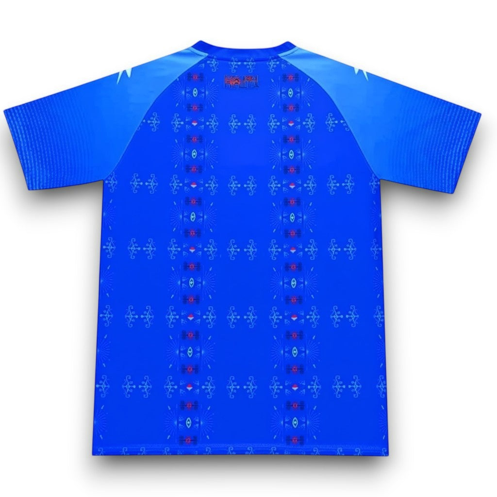 GOATkitz Haiti 2026 adult home jersey, royal blue with red and light blue patterned accents on the back. Short sleeves with ribbed texture.