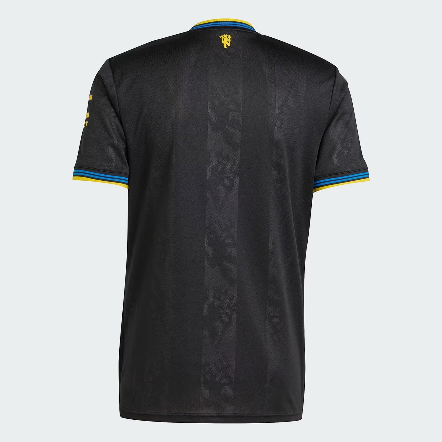 GOATkitz Manchester United 2025-26 adult third jersey in black with blue and yellow trim on collar and sleeves. Features subtle embossed pattern.