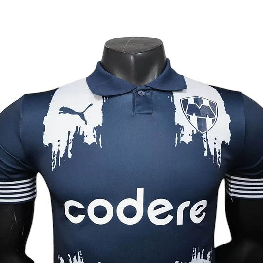GOATkitz navy blue 2025 Club World Cup player version home jersey with white paint splatter design and "codere" logo.