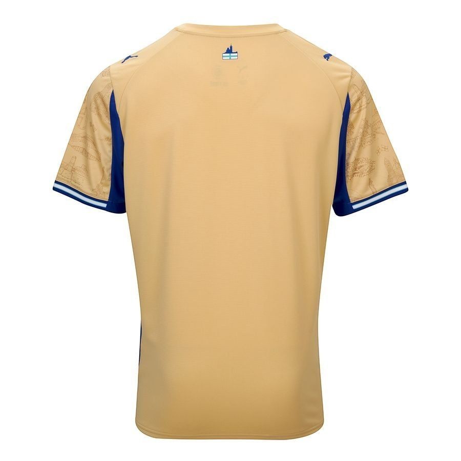 GOATkitz Olympique de Marseille 2025-26 adult fourth jersey in tan with blue accents and a cityscape pattern on the sleeves.