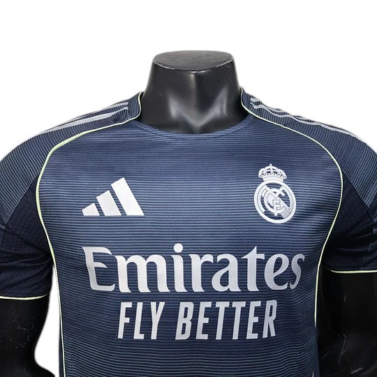 GOATkitz Real Madrid 2025-26 adult player version away jersey in dark blue with white accents. Features Adidas logo and Real Madrid crest.