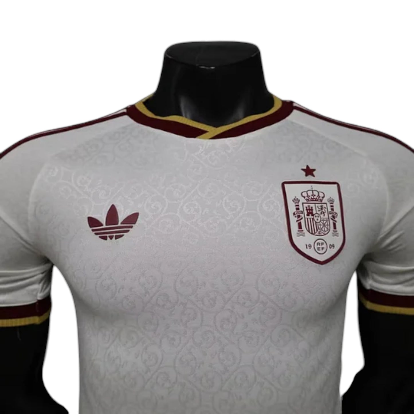 GOATkitz Spain 2026 player version away jersey in white with maroon and gold trim. Features crest and Adidas logo.