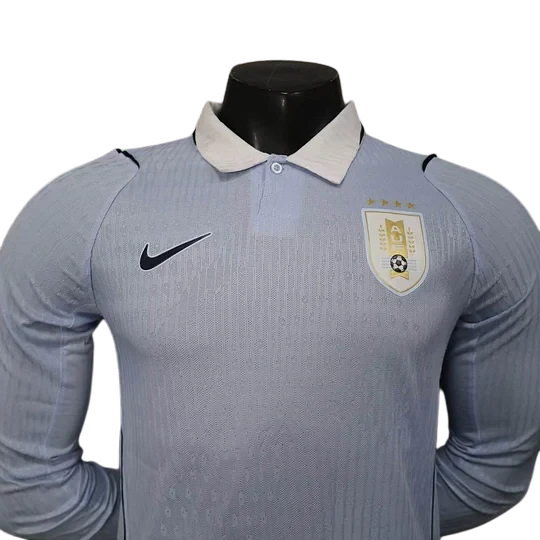GOATkitz light blue long sleeve Uruguay 2026 player version soccer jersey with white collar and embroidered Nike logo.