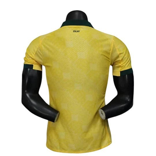 GOATkitz AC Milan 2025-26 adult player version third jersey in yellow with green trim. Customizable name and number.