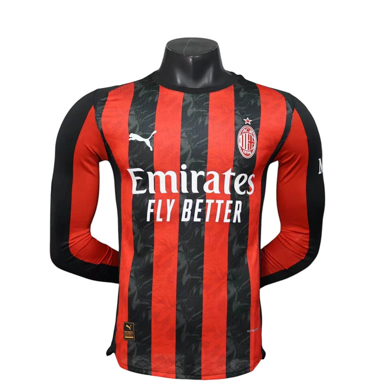 GOATkitz AC Milan 2025-26 player version long sleeve jersey in red and black stripes with Emirates Fly Better sponsor.