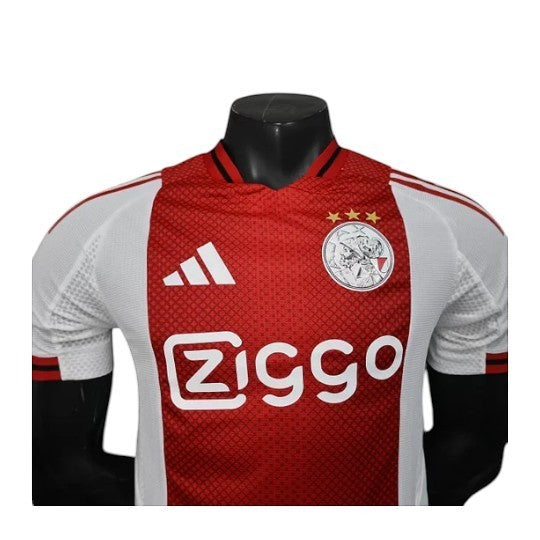 GOATkitz Ajax 2025-26 player version home jersey, red and white with Ziggo sponsor and club crest.