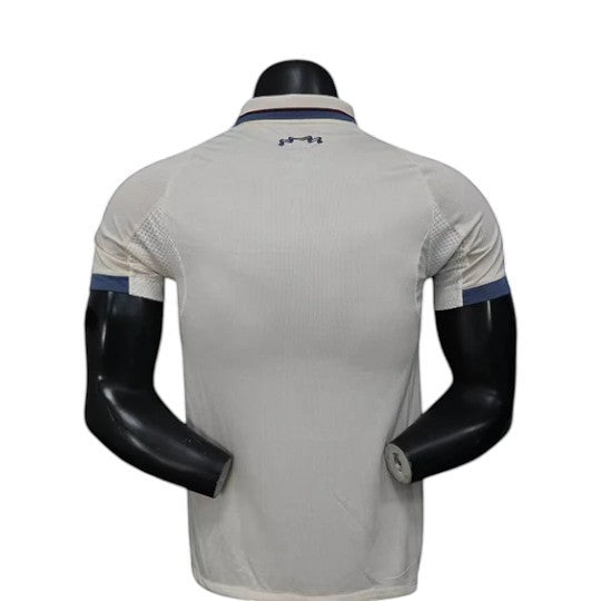 GOATkitz Ajax 2025-26 Player Version Third Jersey, off-white with blue accents on collar and sleeves.