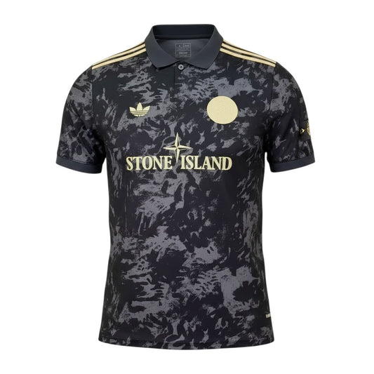 GOATkitz Ajax Stone Island Commemorative Special Edition black jersey with grey camouflage pattern, gold accents, and embroidered logos.