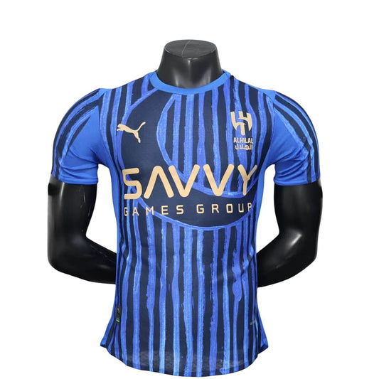 GOATkitz Al-Hilal 2025 Club World Cup player version home jersey in blue with gold Savvy Games Group sponsor and vertical stripe pattern.