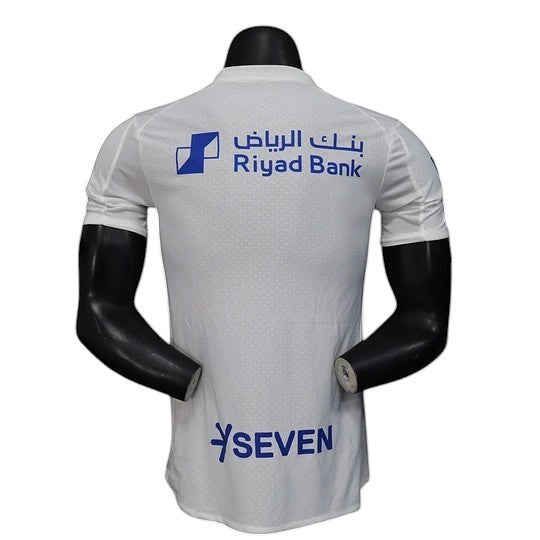 GOATkitz Al-Hilal 2025-26 player version away jersey, white with blue accents and sponsor logos.