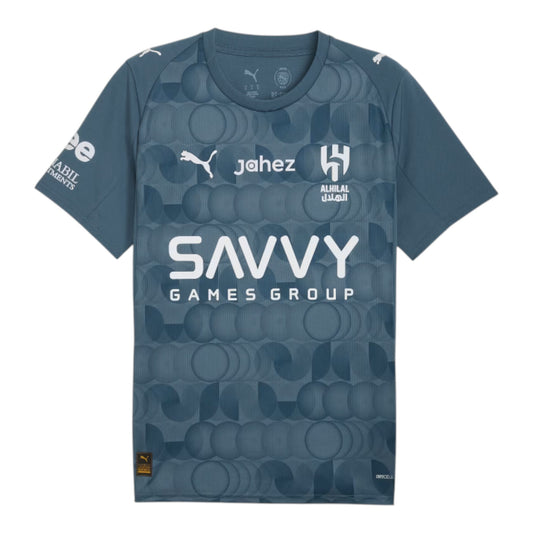GOATkitz Al-Hilal 2025-26 adult third jersey in dark teal with a geometric circle pattern and white sponsor logos.