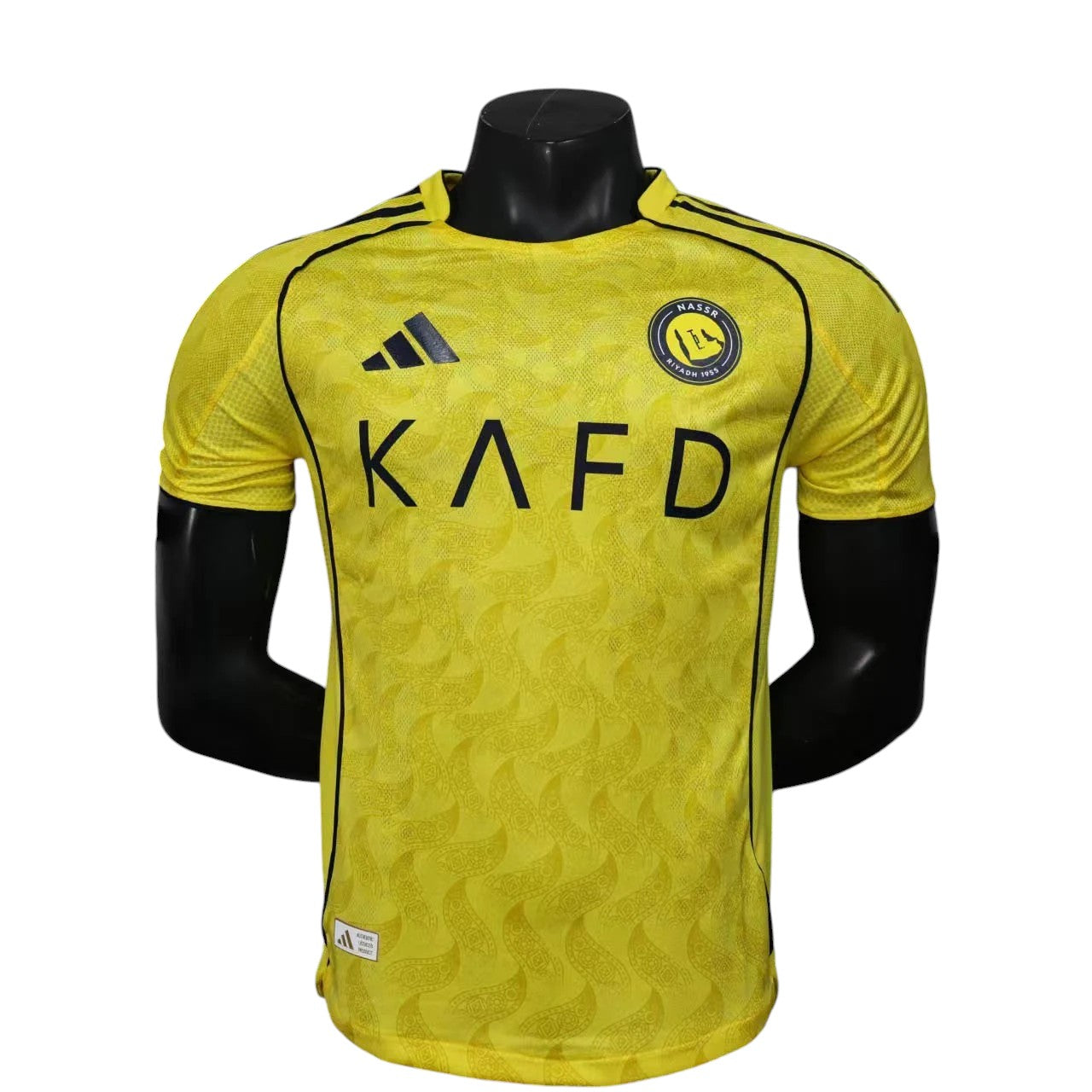 GOATkitz Al-Nassr 2025-26 player version home jersey in yellow with black accents and subtle pattern. Customizable.