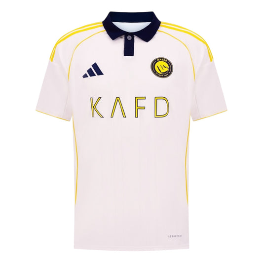 GOATkitz Al-Nassr 2025-26 white football jersey with navy collar and yellow trim. Features club crest and sponsor logo.