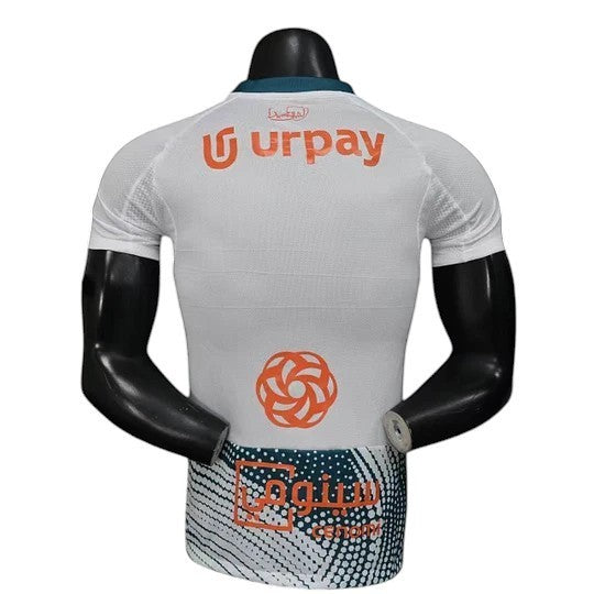 GOATkitz Al-Ahli 2025-26 Player Version Third Jersey, white with orange "urpay" logo and teal collar. Customizable.