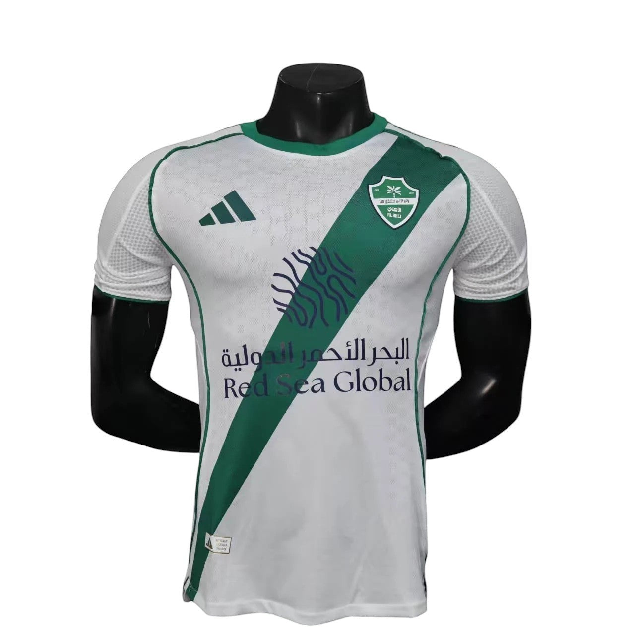 GOATkitz Al-Ahli 2025-26 Player Version Home Jersey in white with green accents and crest. Customizable.