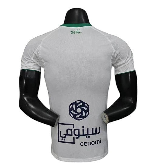 GOATkitz white Al-Ahli 2025-26 player version home jersey with green trim and sponsor logo on back.