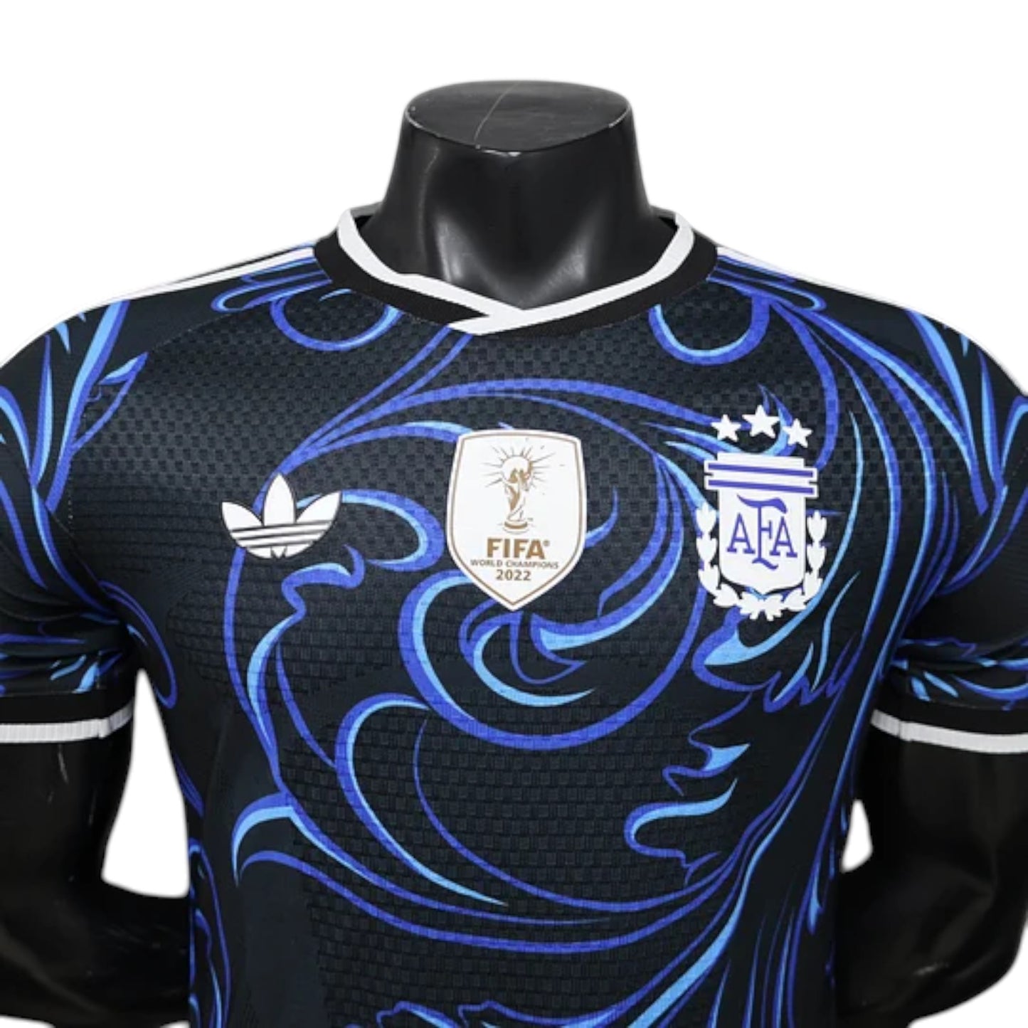 GOATkitz Argentina 2026 player version away jersey, black with blue swirling pattern, FIFA World Cup 2022 badge.