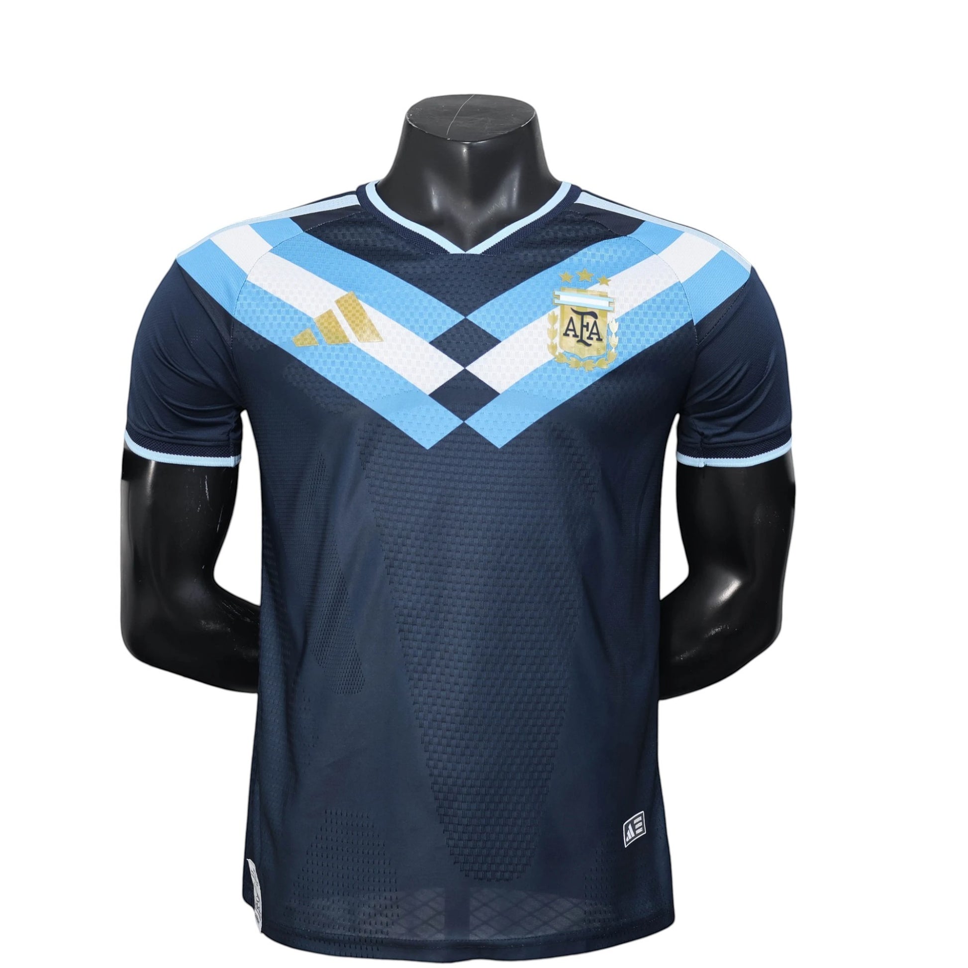 GOATkitz Argentina 2026 Player Version black football jersey with light blue and white chevron details and AFA crest.