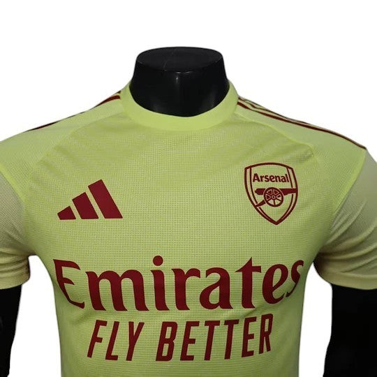 GOATkitz Arsenal 2025-26 Player Version Yellow Goalkeeper Jersey with red Emirates Fly Better logo and Adidas stripes.