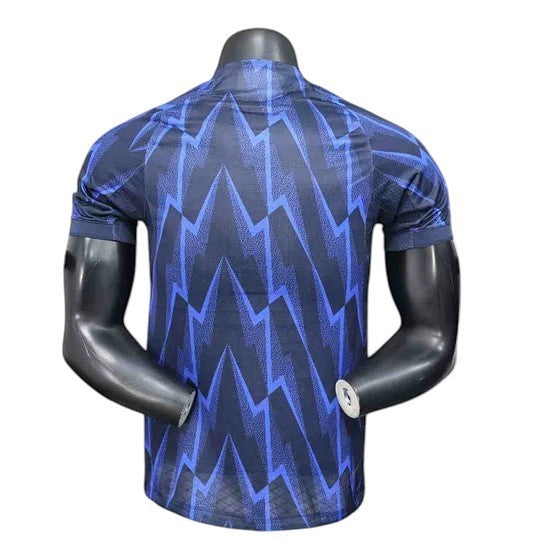 GOATkitz Arsenal 2025-26 adult player version away jersey in navy with blue lightning bolt pattern.