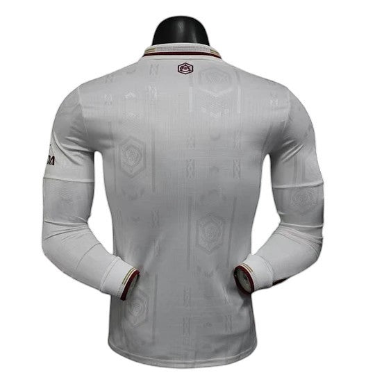 GOATkitz Arsenal 2025-26 white long sleeve player version football jersey with subtle geometric pattern and maroon trim.