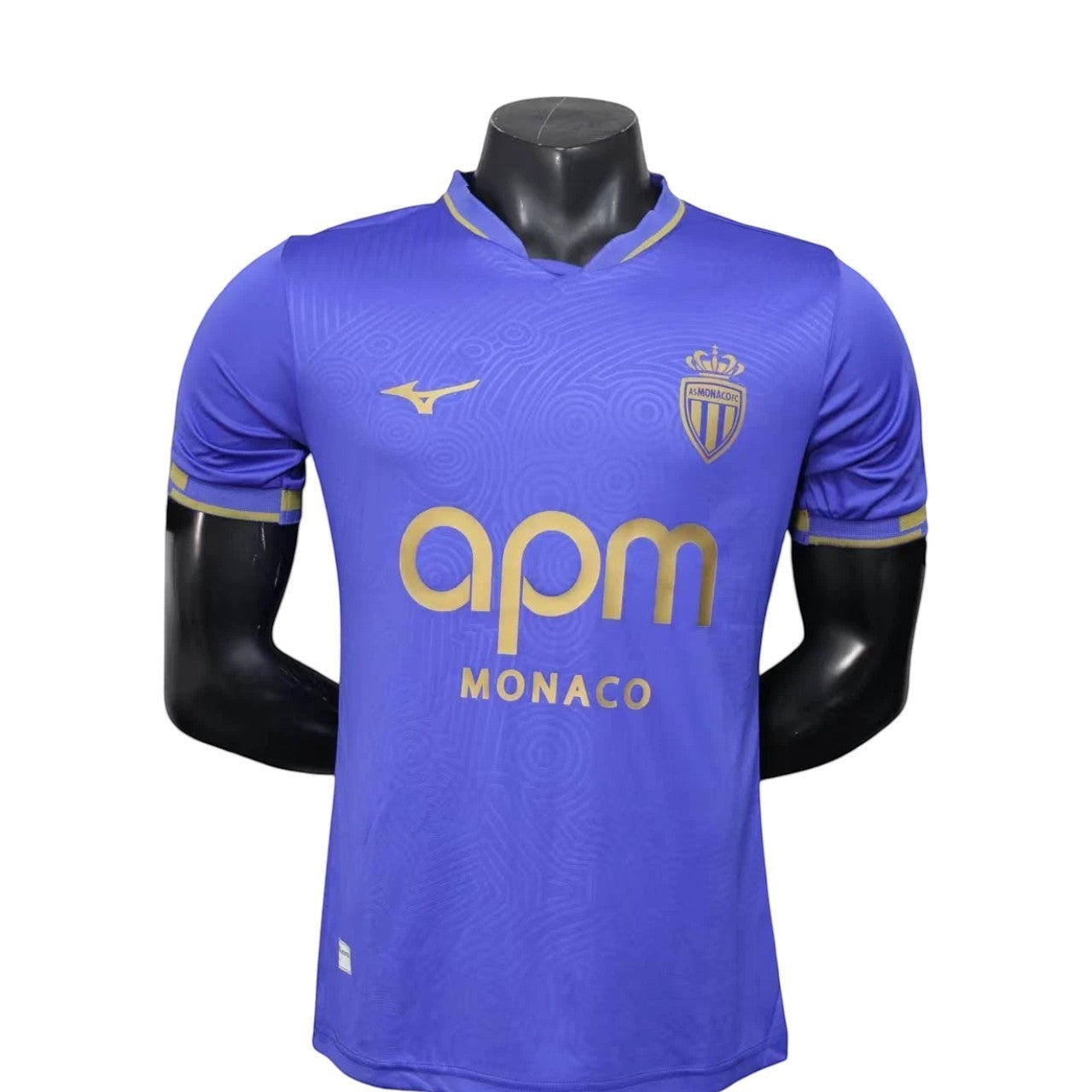 GOATkitz AS Monaco 2025-26 player version away jersey in royal blue with gold accents and APM Monaco sponsor. Customizable.