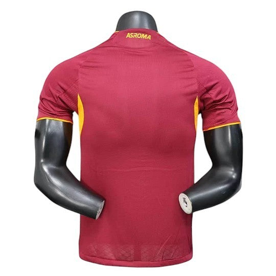 GOATkitz AS Roma 2025-26 adult player version home jersey in maroon with yellow accents. Customizable name, number, and badges.