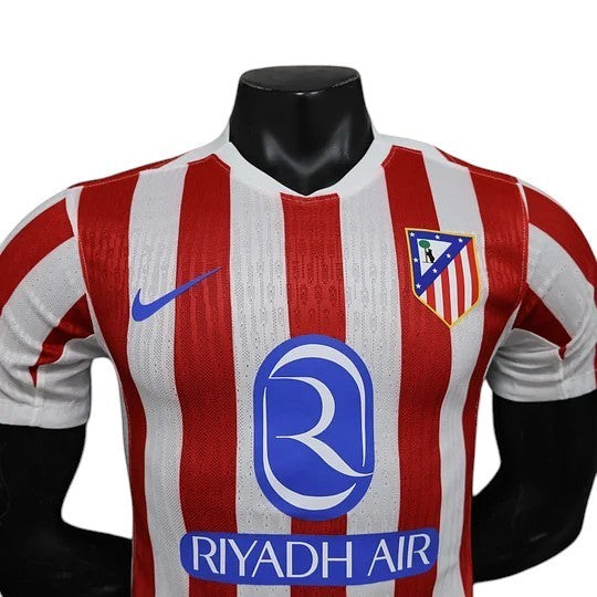 GOATkitz Atlético Madrid 2025-26 player version home jersey, red and white stripes, Nike logo, Riyadh Air sponsor.