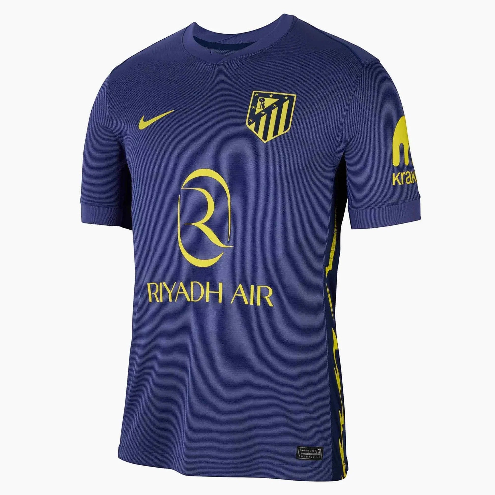 GOATkitz Atlético Madrid 2025-26 adult away jersey in navy blue with yellow accents. Features club crest, Nike logo, and Riyadh Air sponsor.