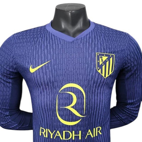 GOATkitz Atlético Madrid 2025-26 adult player version away long sleeve jersey in navy blue with yellow accents and crest.
