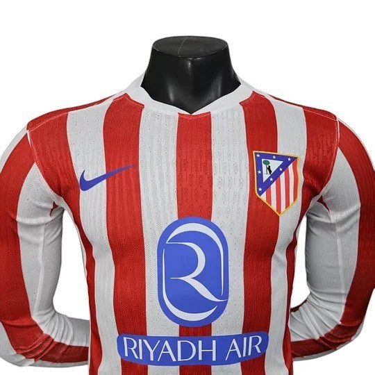 GOATkitz Atlético Madrid 2025-26 red and white striped long sleeve player version jersey with blue accents and club crest.
