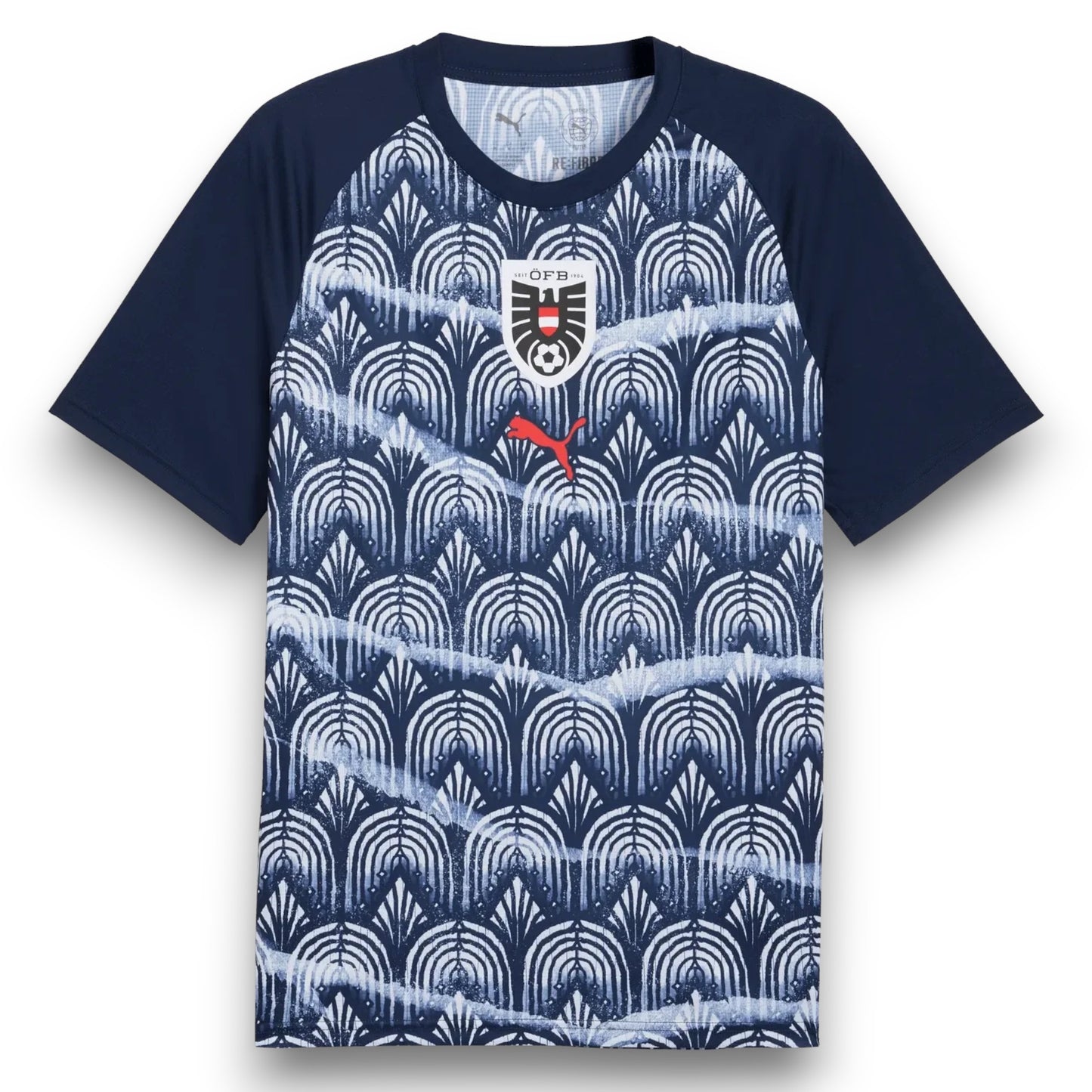 GOATkitz Austria 2026 black training jersey with navy blue sleeves and a repeating white and navy blue art deco pattern. Features the Austrian crest and Puma logo.