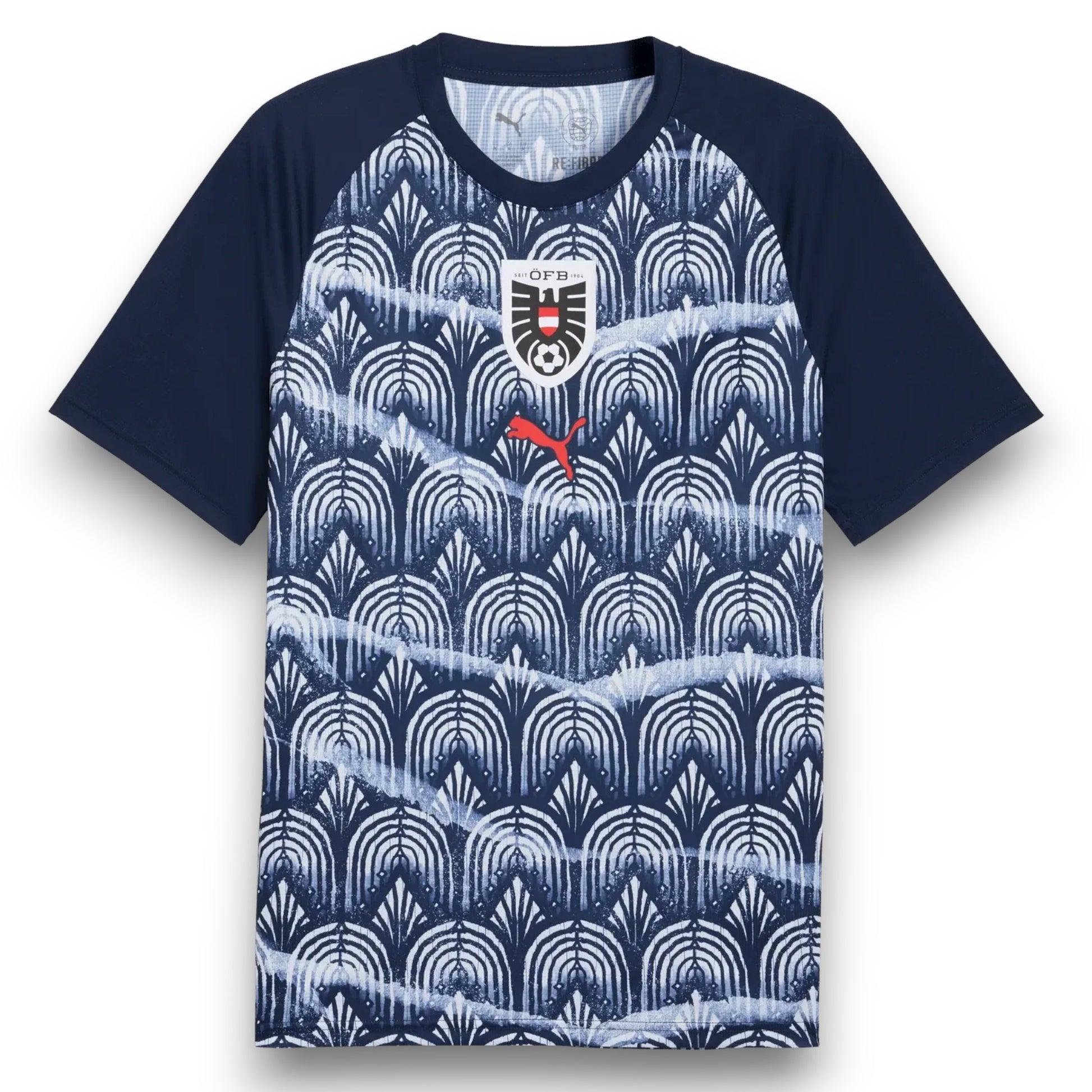 GOATkitz Austria 2026 black training jersey with navy blue sleeves and a repeating white and navy blue art deco pattern. Features the Austrian crest and Puma logo.