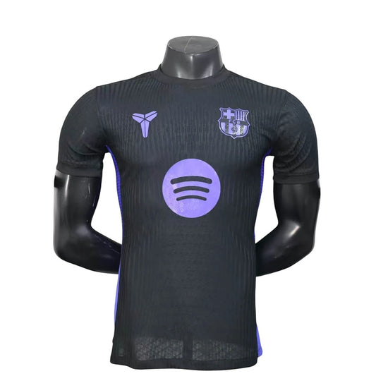 GOATkitz Barcelona 2025-26 black player version away jersey with purple accents and logos. Customizable.