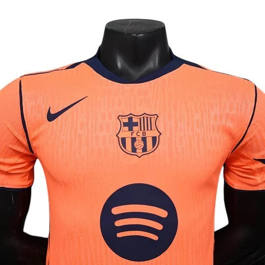 GOATkitz Barcelona 2025-26 adult player version third jersey in orange with navy trim and logos. Customizable.