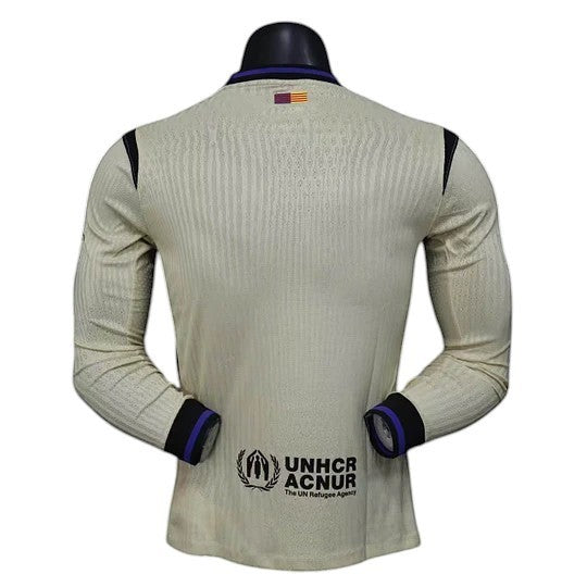 GOATkitz Barcelona 2025-26 away long sleeve player version jersey in light beige with purple and black accents.