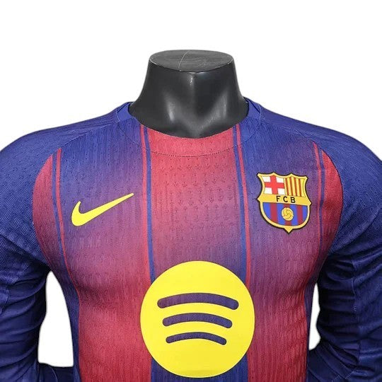 GOATkitz Barcelona 2025-26 adult player version home long sleeve jersey in blue and red with yellow Nike logo and Spotify emblem.