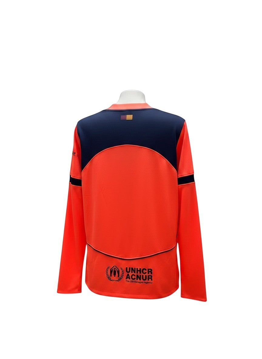 GOATkitz Barcelona 2025-26 adult third long sleeve jersey in orange with navy blue accents and UNHCR logo.
