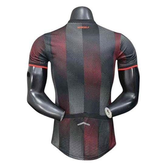 GOATkitz Bayer Leverkusen 2025-26 adult player version home jersey, black with red and white vertical stripes and red trim.