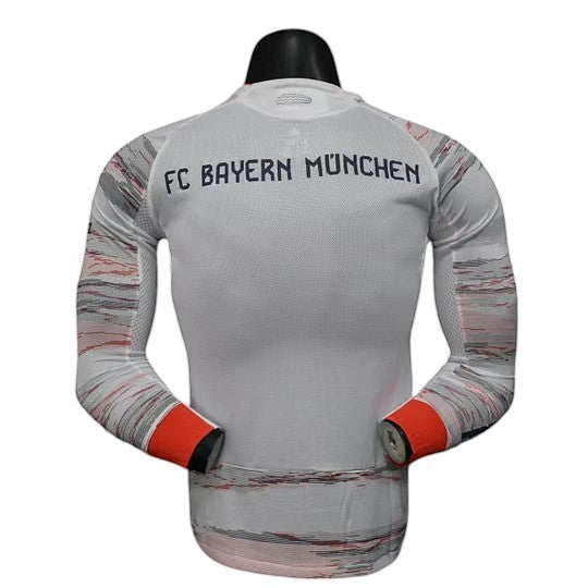 GOATkitz Bayern Munich 2025-26 white long sleeve player version jersey with red and grey abstract pattern on sleeves and cuffs.