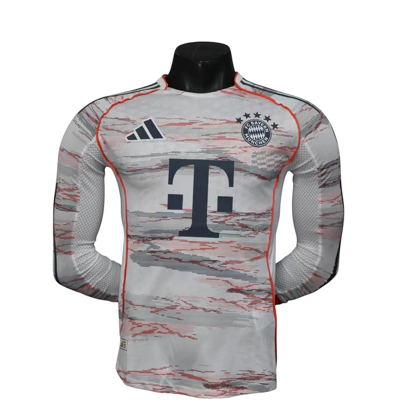 GOATkitz Bayern Munich 2025-26 white long sleeve player version jersey with red and grey abstract pattern, T-Mobile logo.