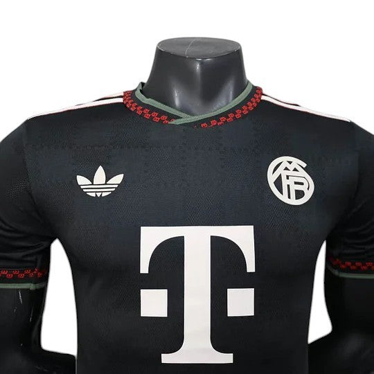 GOATkitz Bayern Munich 2025-26 adult player version third jersey in black with white Adidas logo and T-Mobile sponsor.
