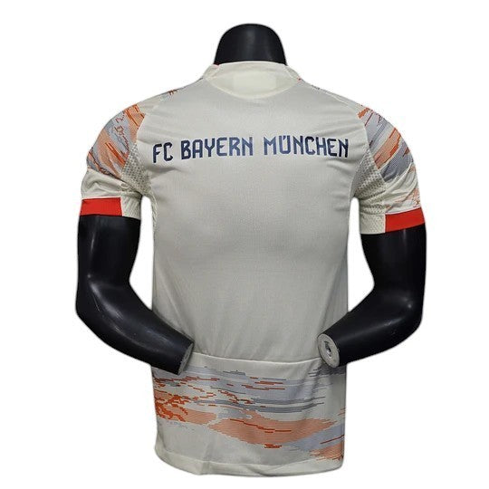 GOATkitz Bayern Munich 2025-26 adult player version away jersey in off-white with orange and grey accents on sleeves and hem. Customizable.