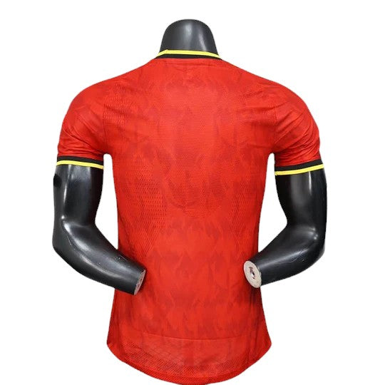 GOATkitz Belgium 2026 player version home jersey in red with yellow trim on collar and sleeves. Customizable.