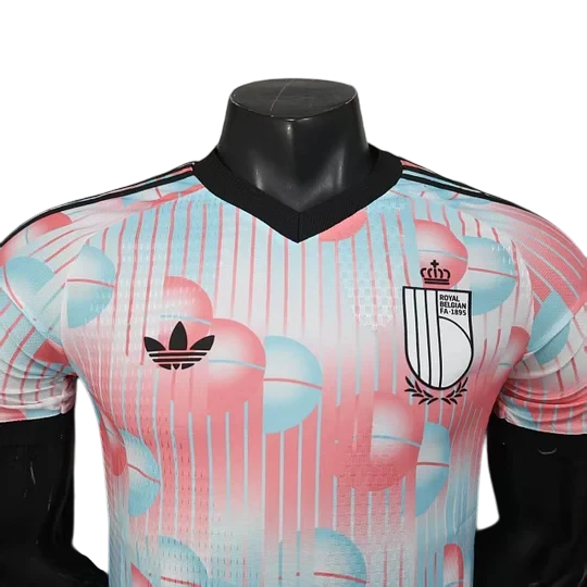 GOATkitz Belgium 2026 player version away jersey with a pink, blue, and white abstract pattern. Features Adidas logo and Royal Belgian FA crest.